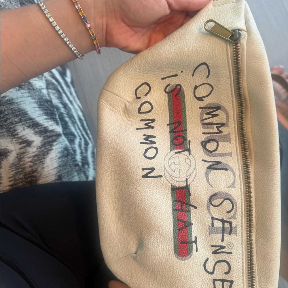 Gucci Beige Leather Clutch with Text Design